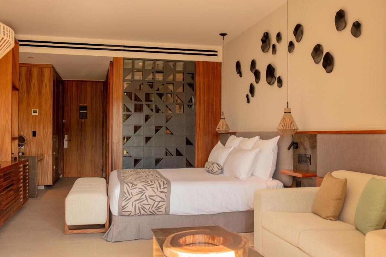 Suite Junior Preferred Club con cama extragrande y terraza