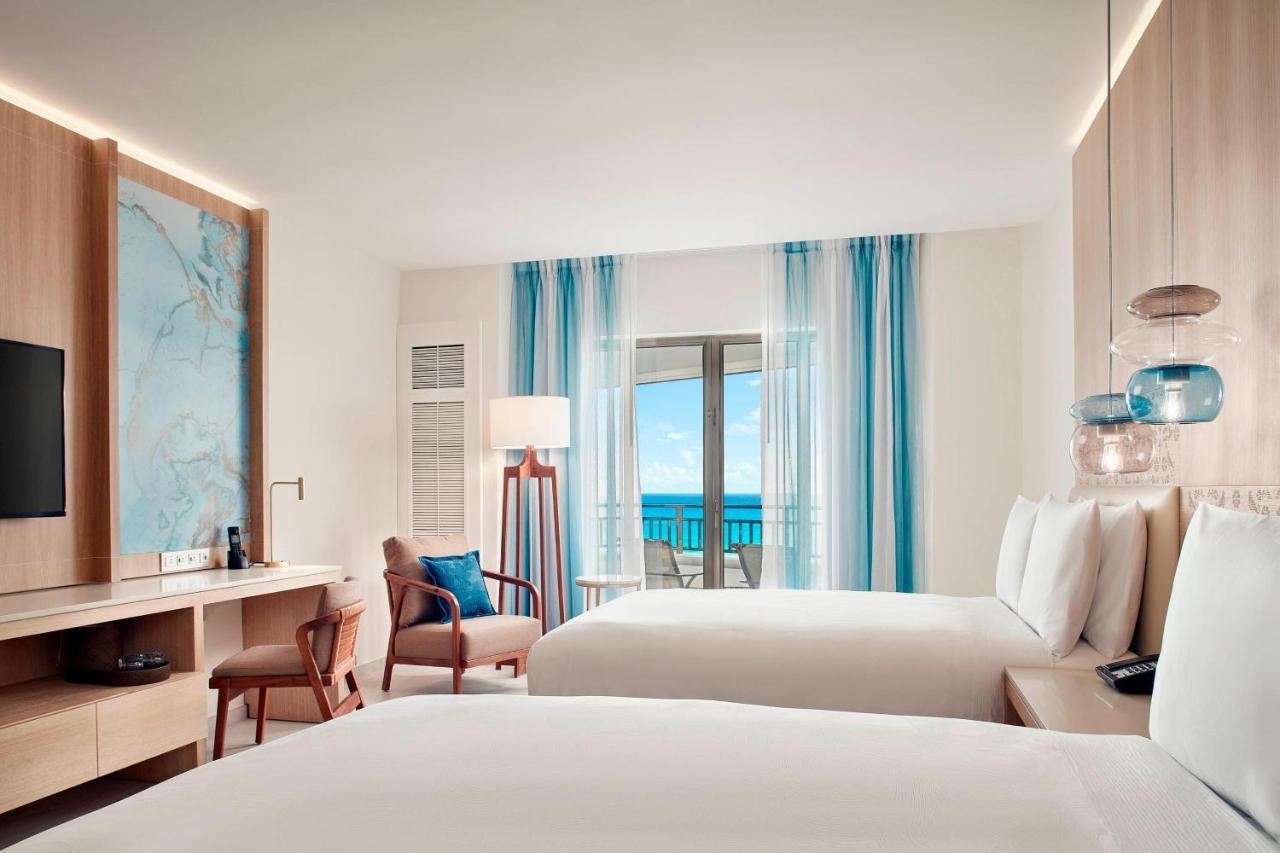 Nivel Club para 2 adultos, Deluxe con vistas al mar y balcón