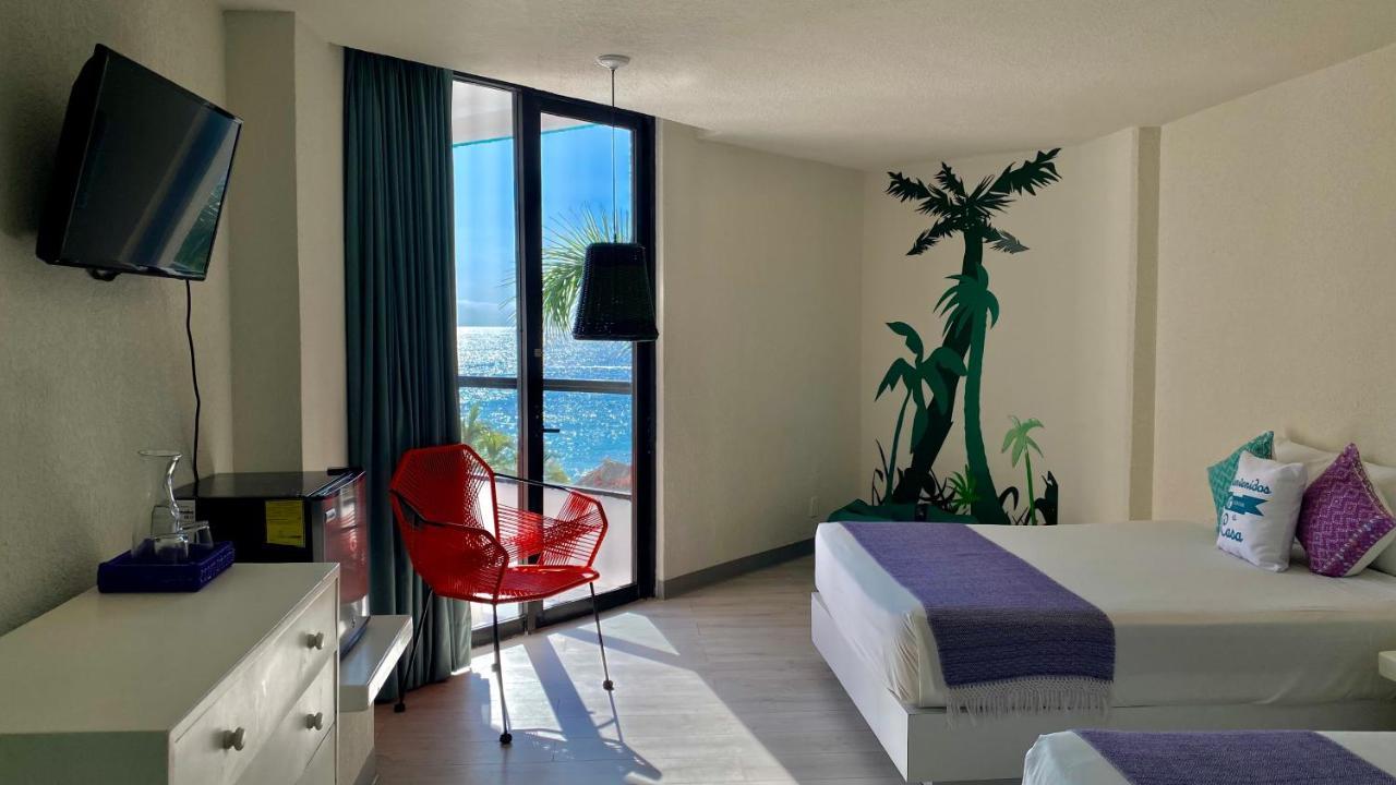 Habitación Doble Deluxe con vistas laterales al mar